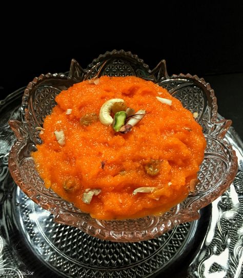 RAVA KESARI RECIPE/KESARI BHATH RECIPE :      A Classic Indian sweet which originated from the South Indian state of Karnataka colloquially called as Kesari Bhath.  Maybe the name 'Kesari' would have been from the word Kesar/Saffron, a common term used for Saffron in India, which is the basic colour of this vibrant sweet.  Rava Kesari/Kesari Bhath, a sweet popular throughout India is prepared with Semolina/White Rava, Sugar, Ghee, Water/Milk. It is called as Sheera/Suji Halwa in North India. Sweets Snap, Madras Recipes, Kesari Recipe, Suji Halwa, Rava Kesari, Semolina Pudding, Bath Recipes, Recipes In Tamil, Dry Fruit