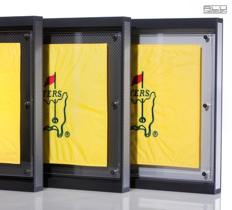 Modern Aluminum Golf Pin Flag Cases Frames, the most modern golf designs available in all aluminum colors with carbon design - MADE IN USA contact ALU DESIGN Golf Golf Flag Display Ideas, Golf Man Cave Ideas, Golf Flag Display, Flag Display Ideas, Golf Bedroom, Golf Man Cave, Office Vision Board, Builder Grade To Custom, Golf Lounge