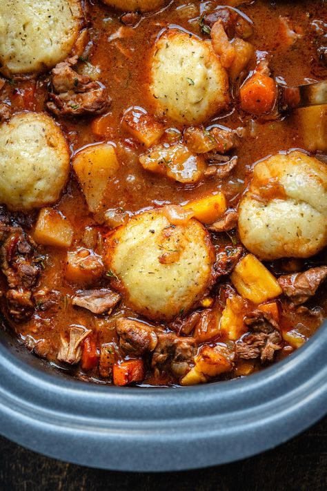 This Slow Cooker Lamb Casserole ticks all the boxes: easy, hearty, comforting and incredibly delicious! Tender, melt-in-the-mouth diced lamb cooked with vegetables in a rich tomato and red wine gravy. Add my easy dumplings and you have a crowd-pleasing meal that the whole family will enjoy. Plov Recipe Slow Cooker, Autumn Slow Cooker Meals, Lamb Casserole Recipes Slow Cooker, Diced Lamb Recipes Slow Cooker, Slow Cooker Lamb Stew, Lamb Stew Recipes Slow Cooker, Diced Lamb Recipes, Lamb Casserole Recipes, Lamb Slow Cooker Recipes