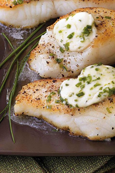 Pan-roasted Sea Bass with Garlic Butter (serves 4):  For perfectly cooked fish, sear it on the stove top until it has a nice golden crust, then finish cooking it in the oven for a fillet that stays moist and flaky. This same technique works well with all types of fish. In this recipe, the sea bass is topped with a flavorful butter to create an instant sauce.   These flaky pan-roasted sea bass fillets topped with chive garlic compound butter will impress your dinner guests every time. Sea Bass Fillet Recipes, Garlic Compound Butter, Sea Bass Recipes, Fish Fillets, Compound Butter, Fish Dinner, Two Fish, Cast Iron Cooking, Seafood Dinner