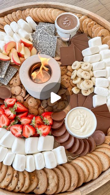 Samantha Bauchmann on Instagram: "COOKIE SMORES BOARD // made with @tatesbakeshop cookies of course! The perfect way to send summer off right and celebrate Labor Day weekend! #smores #labordayweekend #dessertideas #partyfood #charcuterieboard  ITEMS USED: Tate’s Bake Shop Chocolate Chip Cookies Tate’s Bake Shop Salted Caramel Chocolate Chip Cookies Tate’s Bake Shop Snickerdoodle Cookies Tate’s Bake Shop Tiny Tate’s Chocolate Chip Cookies Extra large marshmallows Milk chocolate bars Cookies and cream bars Peanut butter cups bananas apples strawberries Milk chocolate, dark chocolate and white chocolate sauce for dipping" Smore Charcuterie Boards, White Chocolate Smores, Smores Charcuterie Board, Smores Board, Cookie Smores, Samantha Bauchmann, Cookies And Cream Bars, Salted Caramel Chocolate Chip Cookies, Large Marshmallows