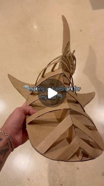 Drew on Instagram: "what is your favorite shark? #artist #cardboardcrafts #whaleshark #hawaii #moana" Room Ideas Hawaii, 3d Paper Crafts Diy Projects, Cardboard Whale Shark Template, Shark Puppet Craft, Paper Shark Craft, 3d Shark Craft, How To Make Paper Animals, Diy Shark Decor, Paper Mache Whale Shark