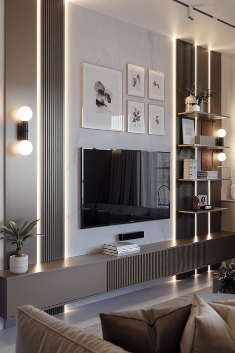 Modern living room with a wall-mounted TV, lit shelving, and framed artwork. Media Wall For Small Living Room, Contemporary Tv Wall Design, Minimalist Tv Wall, Contemporary Tv Wall, Living Room Tv Wall Design, Room Tv Wall Design, Ideas For Small Living Rooms, Tv Wall Design Luxury, Tv Wall Design Ideas