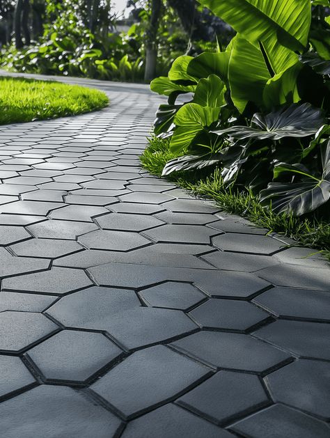 Dark Hexagonal Concrete Pavers Pathway Concrete Pathway Ideas, Dark Pavers, Hexagon Pavers, Walkway Design Ideas, Backyard Concrete, Garden Palette, Concrete Pathway, Garden Pavers, Outdoor Pavers