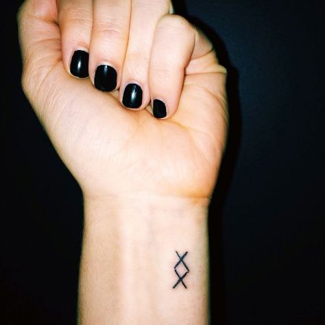 Even small tattoos are a large decision. And despite the size small tattoos can make a statement. We've put together a list of the best small tattoos with deeper symbolic meanings. #top5 #topfive #tattoo #tattooart #tattoodesign Small Tattoos With Big Meanings, Tiny Tattoos With Meaning, Minimalist Tattoo Meaning, Latest Tattoo Design, Unique Small Tattoo, Shape Tattoo, Small Tattoos With Meaning, Meaningful Tattoos For Women, Small Tattoos Simple