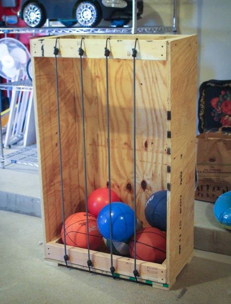 Bungee Ball Storage | RUGGY DIY Ball Organizer, Diy Projects Garage, Diy Storage Projects, Outdoor Toy Storage, Garage Organization Tips, Diy Storage Shelves, Garage Diy, Storage Shed Organization, Diy Storage Rack