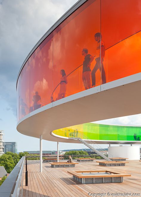 Your Rainbow Panorama, a Rainbow-coloured glass walkway on the roof of the Danish art museum ARoS Aarhus Kuntsmuseum, by Danish-Icelandic artist Olafur Eliasson. Opened 28 May, 2011 Glass Walkway, Architecture Art Nouveau, Icelandic Artists, Olafur Eliasson, Lake Photography, Pedestrian Bridge, Bridge Design, Aarhus, Futurism