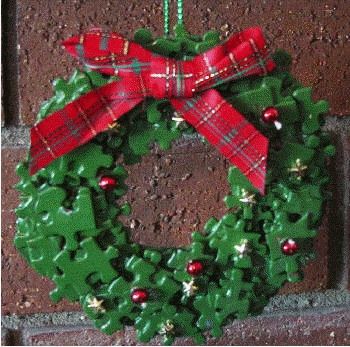 puzzle wreath                                                                                                                                                                                 More Christmas Ornaments Made Out Of Puzzle Pieces, Puzzle Pieces Wreath, Puzzle Pieces Christmas Ornaments, Jigsaw Puzzles Crafts, Puzzle Wreath Craft, Crafts Made With Puzzle Pieces, Puzzle Piece Wreath Ornament, Things To Do With Puzzle Pieces, Puzzle Pieces Crafts Art Projects