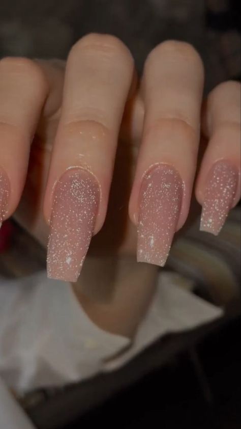 It can be anythingas long as it's holiday-themed Clear Sparkle Gel Nails, Nude Glitter Acrylic Nails, Neutral Nails With Glitter, Clear Glitter Acrylic Nails, Nude Nails Glitter, Glitter Nude Nails, Trendy Nails Glitter, Nude Glitter Nails, Nails With Sparkles