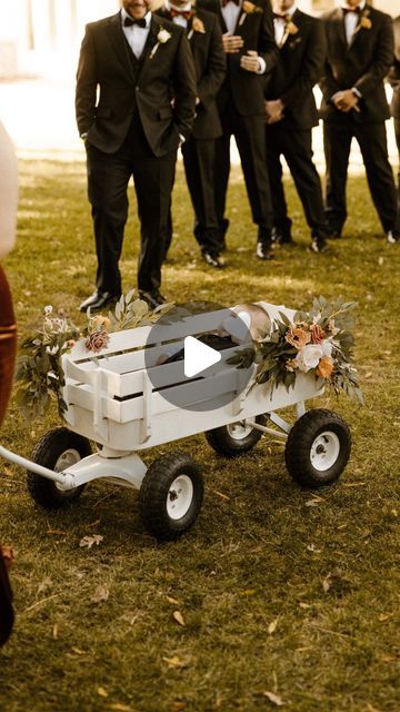 Mindy on Instagram: "DIY wedding wagon Perfect if you have a baby as a flower girl or ring bearer! 🥰 . . . #wedding #fallwedding #ringbearer #flowergirl #weddingflowers #weddingwagon #wagon #diywagon #diy #diyweddingwagon #diywedding #fallweddingdecor #weddinginspo #weddinginspiration #fallweddinginspo #diyfallwedding #whitewagon #diyinspiration #diyproject #lingsmoment #weddingflowers #weddingflorals #fauxflowers #fauxgreenery" Flower Girl Wagons, Wagon Wedding Ring Bearer, Wagons For Weddings, Flower Girl Wagon Ideas Wedding, Wagon For Wedding Baby, Baby Wagon Wedding, Baby Ring Bearer Ideas, Baby Flower Girl Wagon, Wedding Wagon For Ring Bearer