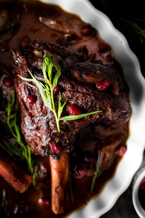 POMEGRANATE BRAISED LAMB SHANKS - My Digital Kitchen Pomegranate Lamb, Persian Pomegranate, Lamb Shank Recipe, Braised Lamb Shanks, Lamb Shank, Braised Lamb, Lamb Dishes, Lamb Shanks, Tongs Kitchen