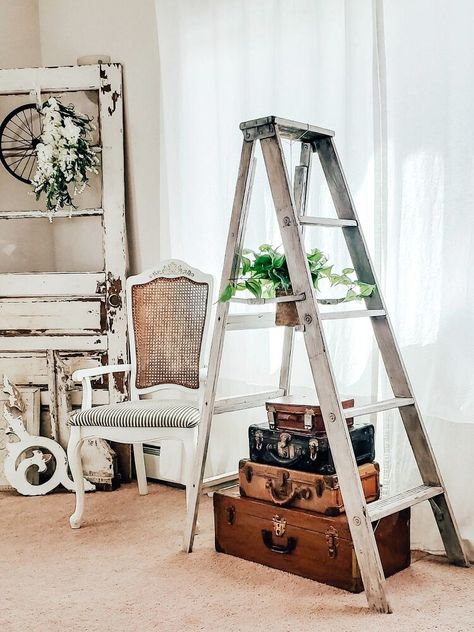 This is an off the wall type project; but it's fun and unique! I have had this wood ladder for a while now. Originally, I painted it and added wood planks as shelves, to create a ladder shelf of sorts. Over the years, the ladder has just been sitting in a corner; but an idea came to me! Why not create a fun piece of decor that's different and not your typical "shelf."That's when I decided a hanging basket plant and some old suitcases could really help turn this old ladder into somethin… Plant Hanger Decor, Galvanized Wall Planter, Diy Tufted Headboard, Patio Installation, Basket Plant, Old Ladder, Diy Blanket Ladder, Bubble Painting, Hanger Decor