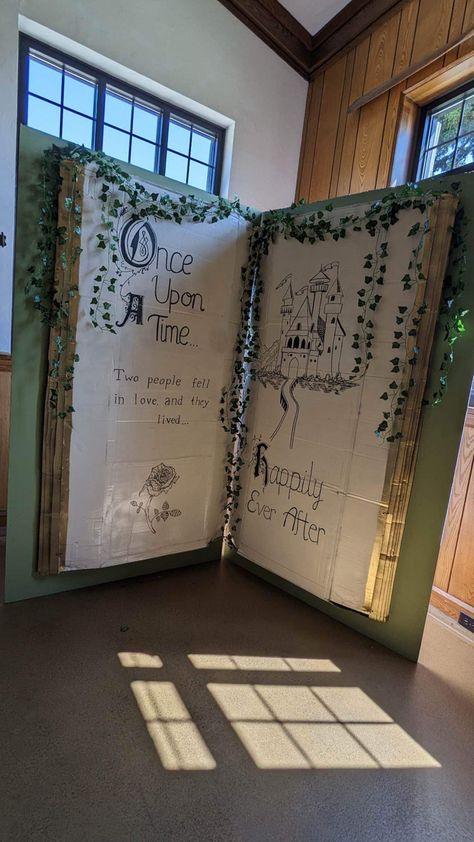 Storybook Graduation Party, Winnie The Pooh Book Backdrop, Fairytale Window Display, Fairy Tale Diy Decor, Story Book Decorating Ideas, Fairytale Homecoming Decorations, Storybook Themed Party, Fairy Tale Room Transformation, Fairy Tale Decorations Party