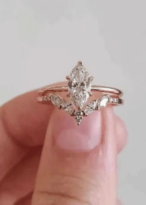 If you're looking for inspiration for a marquis cut engagement ring, this post goes over 47 uniquely gorgeous marquis cut engagement sets! Emerald Marquise Engagement Ring, Marquise Ring Set, Marquise Ring With Wedding Band, Marquise Engagement Ring Set, Marquise Ring Setting, Marquise Cut Rings, Cut Engagement Rings, Cluster Ring Set, Sapphire Engagement Ring Set