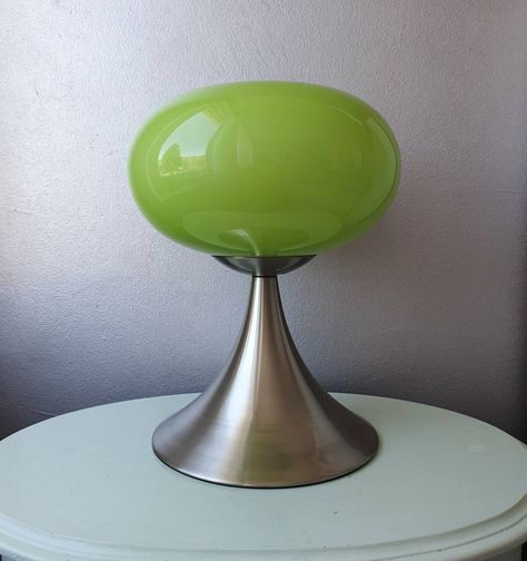 Design mushroom table lamp/night light with touch control. Made in the '80s. Designed by Prisma Leuchten. The lamp has a stainless steel base with a super nice green glass cap above it. The hood has a nice shape. When you touch the foot, the lamp turns on. 3 positions has the lamp, after 4 taps the lamp is off again. Diameter hood 24 cm Height 29.5 cm Diameter foot 19 cm Weird Lamps, 80s Lamp, 80s Furniture, Funky Lamps, Mushroom Table Lamp, Retro Table Lamps, Mushroom Table, Dream Furniture, Side Table Lamps