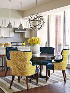 Combining a solid dark blue base with a bright geometric pattern creates a balanced look in this dining area. Find the perfect fabrics for this look: http://blog.fabricseen.com/blue-white-and-yellow-decor-curated-fabric-collection/ Dining Chair Makeover, Blue Chairs, Modern Apartment Decor, Dining Room Colors, Beautiful Dining Rooms, Chair Makeover, Chaise Design, Dining Room Inspiration, Contemporary Dining