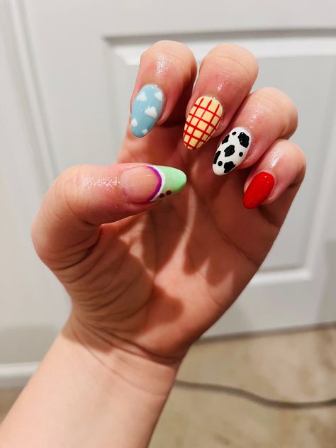 Disney Toy Story Nails
Acrylic Gel Nails
Nail art
Gel art Princess Themed Nails Acrylic, Woody Inspired Nails, Disney Simple Nail Designs, Toy Story Almond Nails, Toy Story Gel Nails, Gel X Nail Designs Disney, Disney Themed Gel Nails, Disney Toy Story Nails, Cute Toy Story Nails