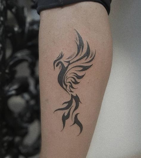 Black and white phoenix tattoo on forearm in tribal style Small Phoenix Tattoo, Phoenix Tattoo Ideas, Phoenix Tattoo For Men, Rising Phoenix Tattoo, Phoenix Tattoo Feminine, Small Phoenix Tattoos, Phönix Tattoo, Phoenix Tattoo Design, Muster Tattoos