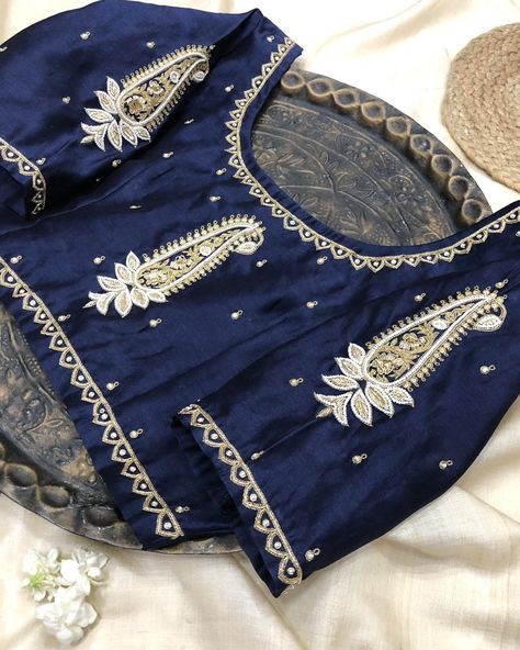 Indulge in opulence with our exquisite navy blue silk chanderi blouse, adorned with stunning hand embroidery. The intricate Paisley motif adds a touch of regal charm, making it the ideal choice for your special occasions. DM now to make it yours! 💙✨ #NavyBlueBlouse #HandEmbroidery #ChanderiSilk #PaisleyDesign #SpecialOccasionWear #FashionStatement #RichTextures #IntricateDetails #LuxuryFashion #CustomOrders #BespokeAttire #FashionistaFaves #ChicStyle #BlouseLove #IndianFashion #Traditiona... Paisley Motif, Navy Blue Blouse, Unique Blouse Designs, Unique Blouse, Paisley Design, Blue Silk, Your Special, Follow For More, Indian Fashion