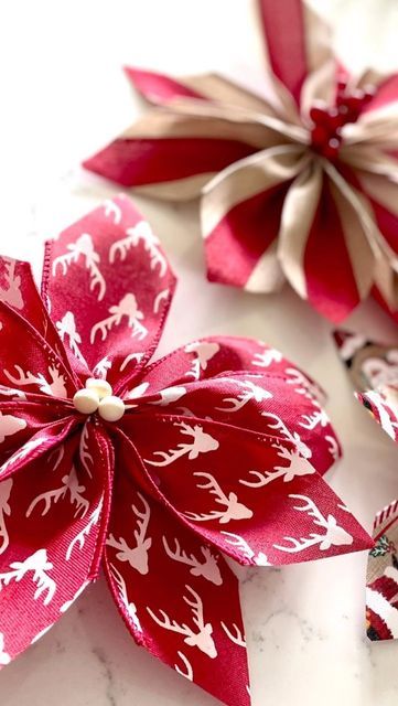 Allison Robertson on Instagram: "Poinsettia bows are the coolest new bow to make this season! They are SO EASY! 📣Sound on to hear the full tutorial 📣 #bowtutorial #ribbonbow #christmasbow" Poinsettia Bows Diy, Poinsettia Diy How To Make, How To Make Poinsettia Bows, How To Make Pointsetta Flowers, Poinsettia Bow Diy, Gift Wrapping Ribbon Ideas Bow Tutorial, Ribbon Poinsettia Diy, Gift Bows Diy Ribbon Easy, Easy Christmas Bows Diy