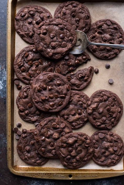 These double chocolate chip cookies will have you reaching for a glass of milk! Double chocolate chip cookies are fudgy, chewy, and easy to make with 10 ingredients. Plus, no chilling the dough so they are ready in 20 minutes. #doublechocolatechipcookies #cookies Double Chocolate Chip Cookie Recipe, Double Chocolate Cookies Recipe, Dark Chocolate Chip Cookies, Salted Chocolate Chip Cookies, Triple Chocolate Cookies, Chewy Chocolate Cookies, A Glass Of Milk, Dark Chocolate Cookies, Double Chocolate Chip Cookies