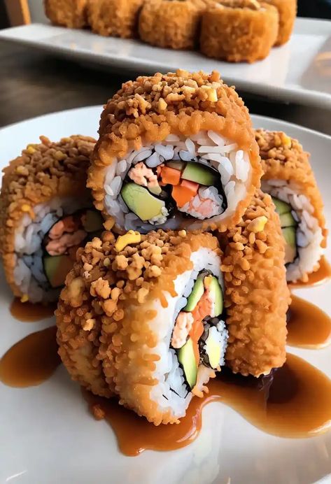 Deep Fried California Roll Recipe

Ingredients

- 1 cup sushi rice
- 1 1/4 cups water
- 1/4 cup rice vinegar
- 1 tablespoon sugar
- 1/2 teaspoon salt
- 4 sheets nori (seaweed)
- 1 avocado, sliced
- 1/2 cup crab meat or imitation crab
- 1/4 cucumber, julienned
- 1/2 cup tempura batter mix
- Vegetable oil for frying
- Soy sauce for serving
- Wasabi and pickled ginger for garnish

Full Cooking Instructions on... Deep Fried Sushi Rolls Recipes, Deep Fried California Roll, Fried California Roll, Fried Sushi Rolls, California Roll Recipe, Deep Fried Sushi, California Roll Recipes, Tempura Batter Mix, Crab Sushi