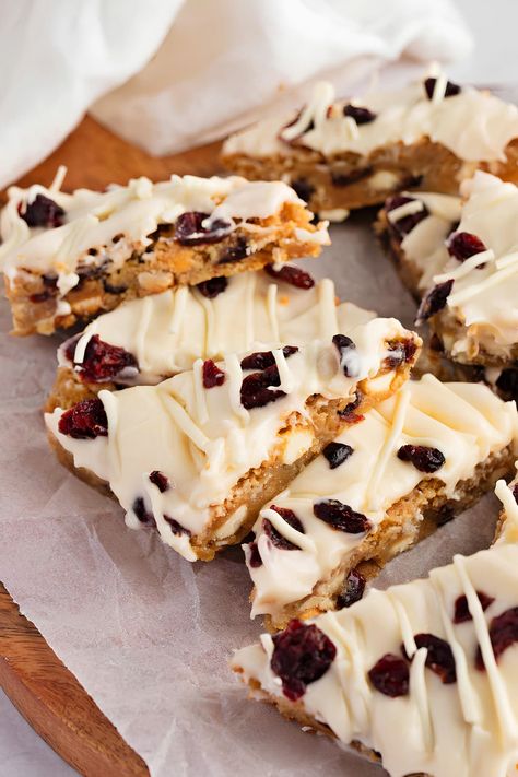 Cranberry Bliss Bars (Starbucks Copycat Recipe) - Insanely Good Bliss Bars Starbucks, Starbucks Pumpkin Bread Recipe, Cranberry Bliss Bars Starbucks, Bliss Bars, Starbucks Pumpkin Bread, Cranberry Bliss, Bliss Bar, Cranberry Bliss Bars, Best Christmas Desserts