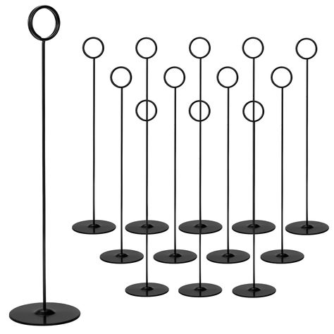 PRICES MAY VARY. Value Pack - Package includes 12 pieces metal table number holders. Color: Black. Unit Size: 12" H x 2.75" base dia. x 1.3" clip dia. Solid and sturdy display stands for centerpieces, food signs, memo notes, wedding table settings and decorations. High Quality Place Card Holder - Tosnail number stands are made of quality steel plated with black color, giving card stands a smooth, shining appearance. Solid and sturdy steel base makes it suitable for outdoor table setting. Versati Table Sign Holder, Tall Table Numbers, Reserved Table Sign, Photo Centerpieces, Reserved Table Signs, Memory Table, Table Number Holders, Place Card Holder, Food Signs