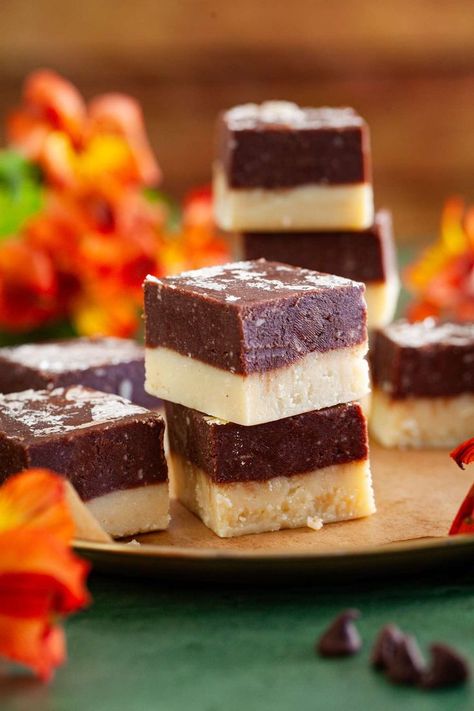 Two pieces of chocolate burfi stacked on each other with orange flowers in background. Recipes With Milk Powder, Milk Powder Recipes, Chocolate Barfi, Indian Goat, Chocolate Burfi, Diwali Mithai, Goat Curry, Barfi Recipe, Diwali Recipes