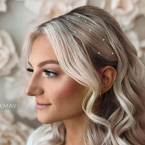 I Do Hair by Kimberly May LLC  Wedding/Event Hair - IL | WI on Instagram: "Tucked Back with Pearls, a fan fav.   What to ask for👇🏻  + Bangs left out with Light Framing + Sides Swept Back + Fluffy Waves + Pearls Pearls Pearls 🥰  Comment 🧜🏻‍♀️ for the Pearls!  🖤 Link in Bio * 2024/2025 Booking Inquiries * Rates * Discounts * Reviews  🖤 Save & Share with a friend needing inspo!  #idohairbykmay  #chicagoweddinghair  #chicagoweddinghairstylist  #lakegenevahairstylist  #weddinghairstylistchicago  #bridesmaidhair  #glamwaves  #longlastinghairstyle  #weddingtips  #weddinghairtips  #fluffywaves  #luxyhairpartner  #luxyhair  #halfuphalfdown #partypony #highupdo  #napervilleweddinghair #elginweddinghair #schaumburgweddinghair  #chicagosuburbsweddinghair" Bride Hairstyle With Pearls, Slicked Hair With Pearls, Bride Hair With Pearls, Bridal Hair Down With Pearls, Hair Down With Pearls, Pearl Hairstyles Wedding, Wedding Hair With Pearls, Hairstyles With Pearls, Side Part Wedding Hair