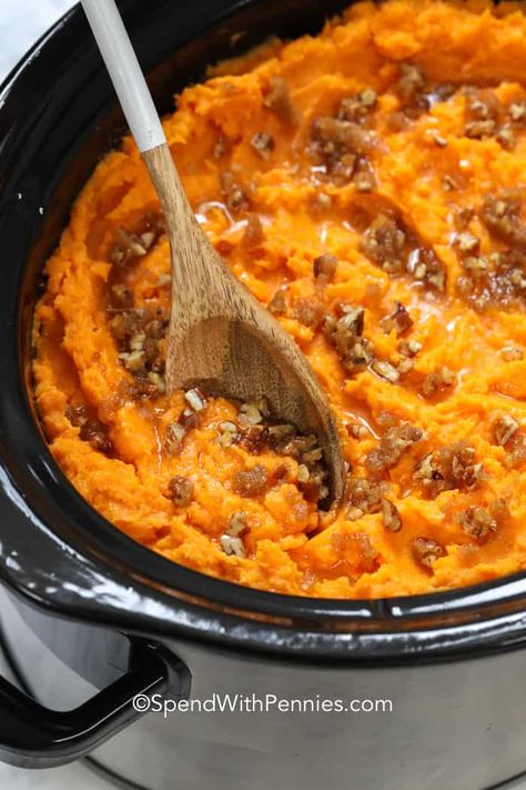 Serve this crockpot sweet potato casserole at your next dinner! It's a classic side at Thanksgiving or perfect for any occasion. Just cook and mash the sweet potatoes and top with a pecan brown sugar topping. #spendwithpennies #sweetpotatocasserole #crockpot #slowcooker #sweetpotatorecipe #sidedish Sweetpotatocasserole Crockpot, Sweet Potato Casserole Crock Pot, Crock Pot Sweet Potatoes, Dinner Feast, Crockpot Potato, Sweet Potato Dishes, Slow Cooker Sweet Potatoes, Thanksgiving Foods, Crock Pot Potatoes