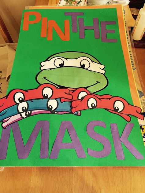 Pin the mask on the turtle game Ninja Turtle Cornhole, Ninja Turtles Birthday Party Games, Pin The Mask On The Ninja Turtle, Ninja Turtle Birthday Party Games, Ninja Turtle Birthday Games, Ninja Turtles Birthday Party Ideas Games, Ninja Turtle 5th Birthday, Ninja Turtle Birthday Party Ideas, Ninja Turtle Party Games