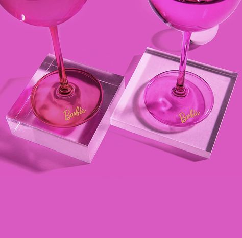 These stunning wine glasses feature iconic Barbie colors and style to give you the ultimate Barbie experience at home; comes with one pink and one magenta glass embellished with signature Barbie branding on the base Pink Wine Glasses, Wine Set, Wine Glasses, New Collection, At Home, Branding, Wine, Glass, Pink