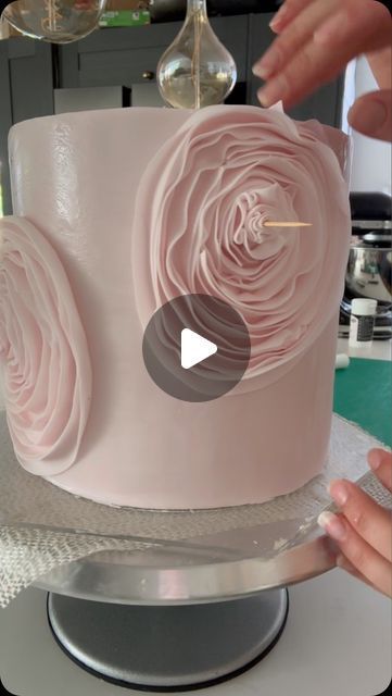 Claire Lawrence Cake Design on Instagram: "Fondant rosette ruffles 🩷 a little story about this tier - I decorated the whole tier, was really happy with how it looked, but it was a hot and humid day so I decided to store it in my insulated box overnight. This box has a removable ice pack which wasn’t frozen at that point but it was still cold so I thought that should be perfect as I didn’t want it to be fridge cold, just cooler than my kitchen….anyway that was a silly idea, when I came downstairs the following morning to check on it, about a quarter of the ruffles had slipped off the cake 😩😩😩 I’m guessing the ice pack caused moisture inside the insulation box 🤦‍♀️ I had to spend another hour re doing it! Silly me! 

Sugarpaste: @couturesugarpaste 

#fondantruffles #cakedecorating #wedd Square Rosette Cake, Cakes For Women Birthday, Rosette Cake Ideas, Ruffle Cake Tutorial, How To Make Ruffles, Birthday Cake For Women, Rosette Cake Wedding, Fondant Ruffles, Tiered Cake Design