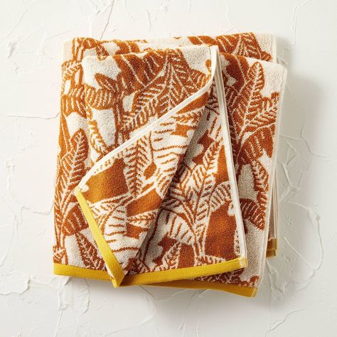 Make your bathroom feel more inviting with this 2-Pack Paradise Bath and Hand Towel Set from Opalhouse™ designed with Jungalow™. This set includes a bath towel and a hand towel, both crafted from 100% jacquard cotton fabric for a soft feel and plenty of absorbency. Featuring an allover print of leaves in a rust hue on a cream background, the towels are sure to bring eye-catching style to your bathroom decor. Meet Justina Blakeney of Jungalow, now partnering with Opalhouse to inspire lived-in spa Boho Towels, Patterned Towels, Jungalow Decor, Bath Hooks, Bath Redo, Inspirational Board, Patterned Bath Towels, Justina Blakeney, Print Comforter