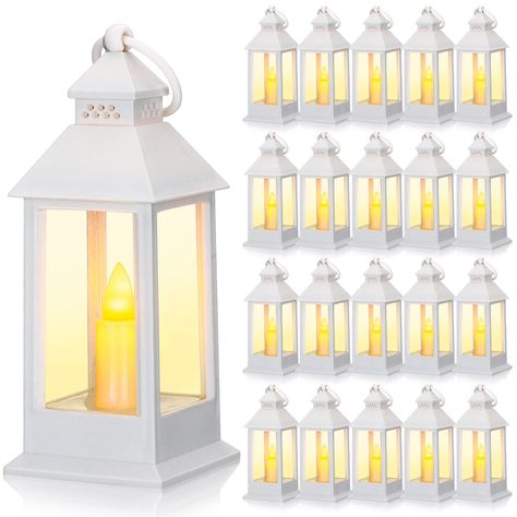 PRICES MAY VARY. Package Contents: you will get 24 pieces decorative lanterns for home decor, battery included; The interior is in the shape of candles, flameless and bright, allowing you to enjoy the ambiance of candlelight safely Cute Centerpieces: the candle lantern is lovely; Not only is it exquisite when hanging, but when you place it near a wall or simply set on the table, bright enough to illuminate your table in the dark, a beautiful table decor for your home Flickering Effect: the mini Led Candles Wedding, Lantern For Wedding, Lantern Decorations, Hanging Candle Lanterns, Lantern Decor Wedding, Hanging Candle, Mini Lanterns, Lantern Centerpieces, White Lanterns