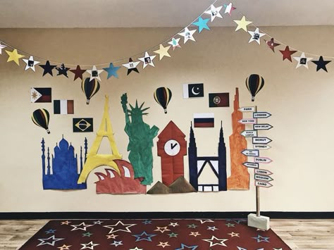 World Cultures Classroom Decorations, Around The World Vbs Decor, Around The World Float Theme, Around The World Theme Decorations, Around The World Stage Decor, Around The World Homecoming Theme, Library Adventure Theme, International Decorations Ideas, Around The World Bulletin Board Ideas