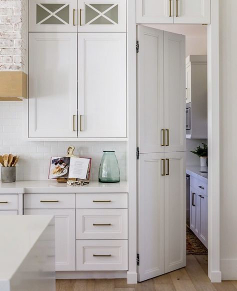 A hidden door to the #pantry masked by cabinetry doors. Now that just screams CUSTOM! . Design Inspiration: @theolsenhomedesign Photo: @lindsayjsalazar #pantrydesign #kitchendesign #hiddenpantrydoor #hiddendoor #whitekitchen #whitekitchendesign Hidden Door Design, Kitchen Renos, Lake Kitchen, Kitchen Pantry Doors, Pantry Layout, Door Design Ideas, House Pantry, Hidden Doors, Hidden Cabinet