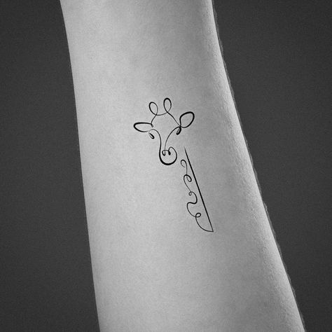 African Continent Tattoos For Women, Africa Design Tattoo, Original Small Tattoos, Tiny Giraffe Tattoo, Simple Giraffe Tattoo, Minimalist Giraffe Tattoo, Girraffe Tattoo Ideas, Tattoos Africa, Baby Giraffe Tattoo