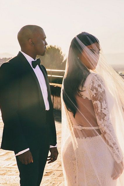 Kim Kardashian and Kanye West said their "I dos" on May 24, 2014, and by Sept. 1, 2014, Kim was still sharing pics from their lavish wedding weekend! In promotion of the Keeping Up with the Kardashians season finale, the newlywed Instagrammed a stunning photo of her posed with her groom, writing: "#LOVE #TONIGHT #FINALE." From the high-fashion digs to the A-list guests to the European jet-setting, this was a wedding fit for a Hollywood power couple! Click the pics to go inside Kimye's ...    118 Kimye Wedding, Kanye West Wedding, Celebrity Wedding Hair, Jamie Hince, Kim Kardashian Wedding, Kardashian Wedding, Estilo Kardashian, Kim Kardashian Kanye West, Fearne Cotton