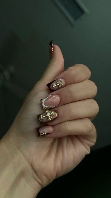 French tip maroon and gold nails with cross gems Red Shirt Nails Acrylic, Nails With Cross Gems, Red French Tip With Gems, French Tip Maroon, Nails That Go With Every Outfit, Hobo Nails, Cross Gem Nails, Maxamilist Nails, Gold Cross Nails