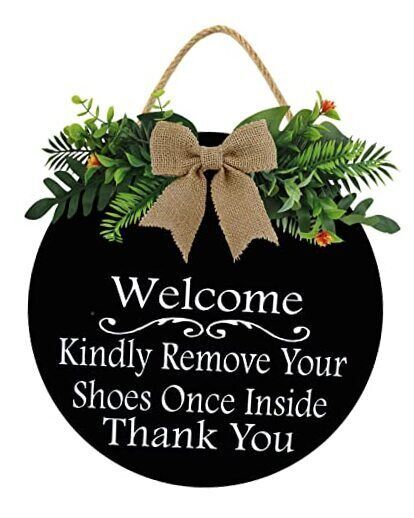 30 Days Return Policy Fast Delivery Trusted seller Welcome, Please Remove Your Shoes Sign - Solid Wood Hanging Plaque with Rope, Polite Message - Dark Wood, Protective Coating for Outdoor use - Rustic Entryway, Porch, Door Hanger Product Description * Cute Sign: Welcome people into your home with our charming wooden hello sign, let your family and friends feel warm and enthusiastic. * Farmhouse Decoration: Rustic sign with artificial green plants and beautiful bows, keep your front door seasonal and complement any other decorations. * Easy to hang: The front porch sign with a burlap ribbon hanger for ready hanging and not easy to fall off. Also the cute exquisite gift to anyone. * Widely Used: Perfectly fit to hang at the position of the front door, back door, room door, wall position near