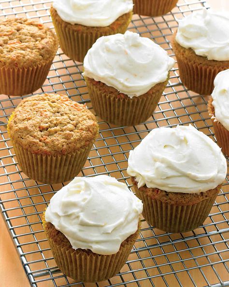 Carrot Cupcakes Recipe | Martha Stewart Living _ We love the blend of spices (cinnamon, ginger, and nutmeg) in these knockout cupcakes, as well as their moist, tender crumb. Martha Stewart Carrot Cake, Frosting For Carrot Cake, Beer Desserts, Carrot Cake Cream Cheese Frosting, Root Beer Cupcakes, Martha Stewart Cupcakes, Carrot Cake Cream Cheese, Cake Cream Cheese Frosting, Carrot Cake Frosting