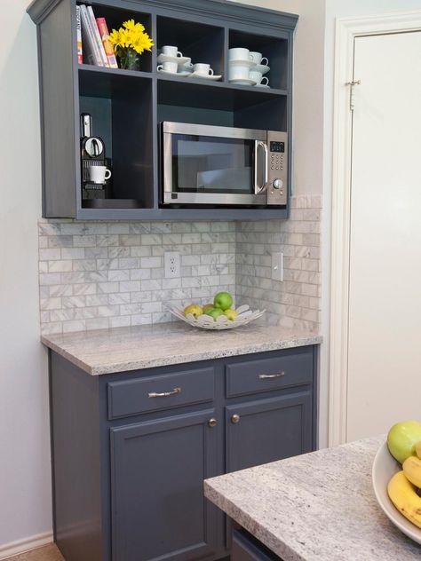 A mix of traditional cabinetry and open shelving provides maximum storage space in this kitchen featured on HGTV's Buying and Selling. The upper shelving unit frees up valuable counter space by housing the microwave and espresso machine, while a neutral subway tile backsplash complements the stone countertops. Kitchen Open Shelving, Kitchen Drawer Storage, Microwave Shelf, Microwave Cabinet, Neutral Kitchen, Kitchen Cabinet Drawers, Kitchen Open, Open Kitchen Shelves, Estantes Flotantes