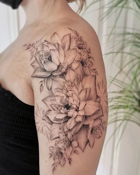 30 Stunning Lotus Tattoo Ideas Lotus Flower Upper Arm Tattoo, Shoulder Cap Tattoos For Women Mandalas, Lotus Flower Arm Tattoo, Disney Floral Tattoo, Mandala Floral Tattoo Design, Lotus Tattoo Shoulder, Lotus Tattoo Ideas, Jam Tattoo, Tattoo Lotus Flower