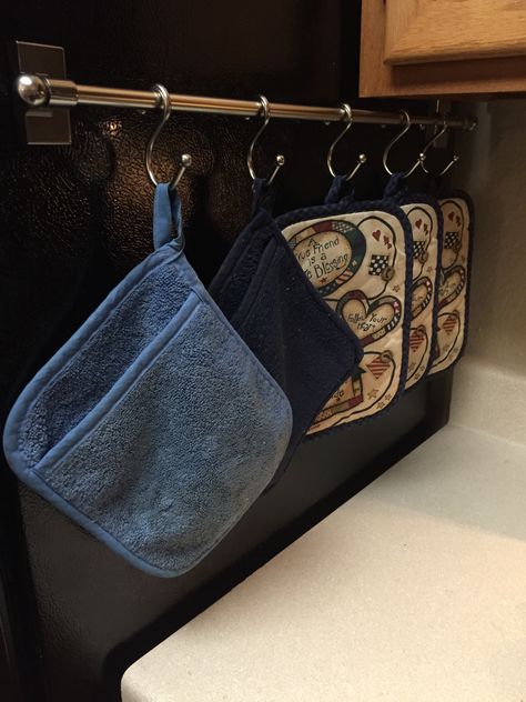 Great way to hang your pot holders and free up a kitchen drawer. Just buy some shower hooks and a magnetic curtain rod and hang on the side of your refrigerator. Pot Holder Organization Ideas, Pot Holder Storage Ideas, Pot Holder Storage, Kitchen Rod With Hooks, Diy Kitchen Hanging Storage, Magnetic Curtain Rod, Shower Hooks Ideas, Magnetic Hooks, Hanging Pots And Pans Small Kitchen