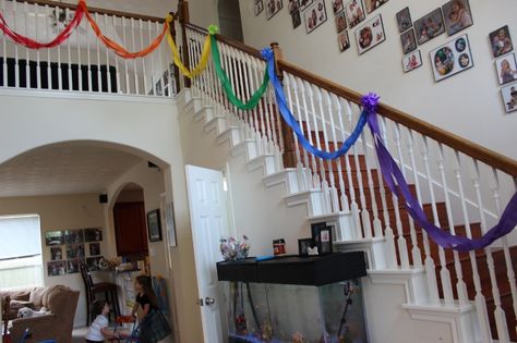 streamers on the stairs; sjsweetstx.com Streamer Staircase Decor, Birthday Party Staircase Decor, Birthday Stairs Decoration, Orange Vbs, Streamer Party Decorations, Streamer Decorations, Birthday Morning, Gymnastics Party, Modern Indian Art