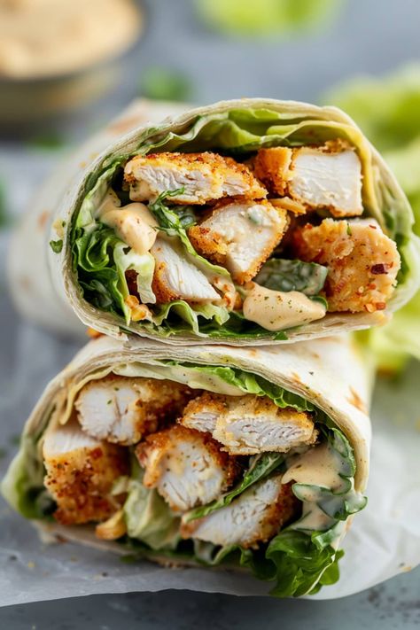 This easy Chicken Caesar wrap will be your new favorite! It's a restaurant-quality wrap that couldn't be easier to make at home. Sandwich And Wrap Ideas, Fried Chicken Caesar Wrap, Takeout Food Ideas, Best Chicken Wrap Recipes, Buffalo Chicken Caesar Wrap, Simple Chicken Wrap Recipes, Healthy Chicken Ceaser Wraps Recipe, Carb Free Lunch Ideas, Easy Chicken Caesar Wrap