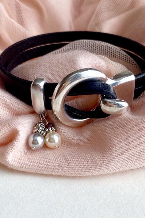 Feminine pearl and leather bracelet features two Swarovski pearls and a hint of garnet. From Red Moon Jewelry $44.50, FREE shipping and your choice of two leather colors. #redmoonjewelry Silver Wrap Bracelet, Pearl Charm Bracelet, Leather Colors, Handmade Leather Bracelets, Jewelry Instagram, Red Moon, Beaded Wrap Bracelets, Wrap Bracelets, Leather Bracelets