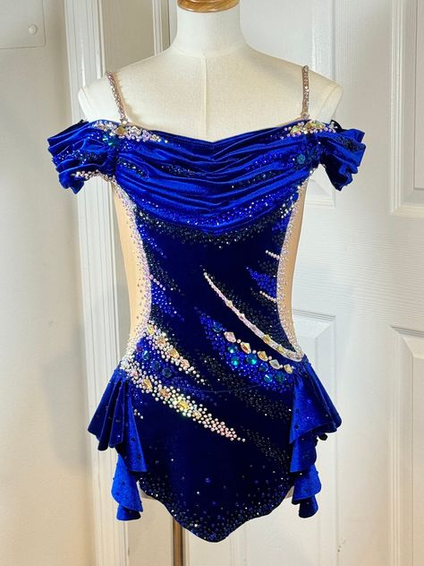 We welcome fully customized requests. Available in all colors. Be sure to message me before ordering. This piece is perfect for competition wear/ Figure Skating/Rhythmic gymnastics PLEASE NOTE  Custom lead time is 8-10 weeks. Please message your competition date or when you need it by, and order with ample time. RETURN POLICY No returns on custom costumes or deposits. We can only provide credits and alterations. ORDER TO MADE Please include: 1. Chest, waist, hips, and girth measurements 2. Color 3. Date of your competition and when you would like it by 4. Any changes or requests Please contact me if you have any dissatisfaction about your order. If there are any issues, we want to turn that around. Thank you so much! Blue Dance Dress, Colorguard Uniforms Dresses, Dance Competition Outfits, Blue Dance Costumes, Blue Jazz Costume, Blue Competition Suit, Blue Acrobat Costume, Ocean Inspired Dance Costume, Figure Skating Dress Rhinestones